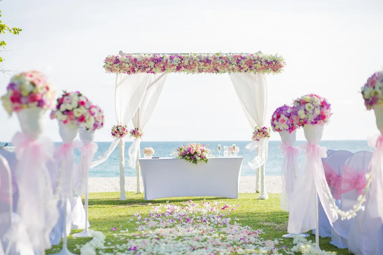 Dream beach wedding setup created by the best destination wedding planners in Thrissur with floral elegance. it is for the best event management services in thrissur